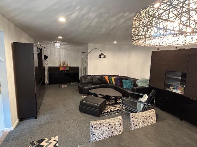 257 Cedarhurst Ave Unit A 8, Cedarhurst, NY 11516 - living room featuring recessed lighting, carpet, and a fireplace