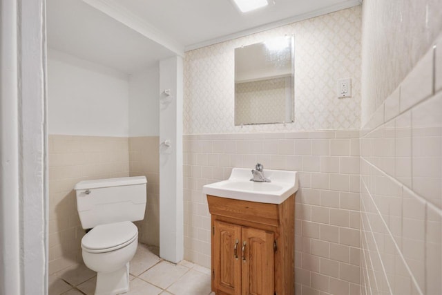 65 Hortontown Rd, Carmel, NY 10512 - bathroom featuring vanity, wallpapered walls, a wainscoted wall, tile patterned flooring, and tile walls