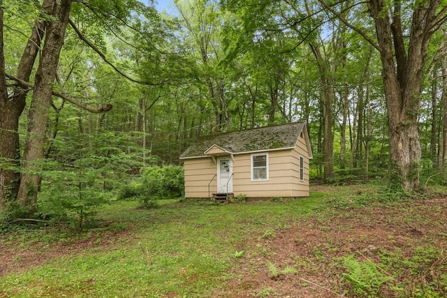 65 Hortontown Rd, Carmel, NY 10512 - view of outbuilding with a forest view