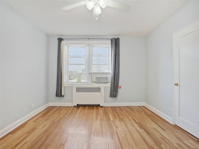 90 Bryant Ave Unit 3Da, White Plains, NY 10605 - empty room featuring radiator, wood finished floors, and a ceiling fan