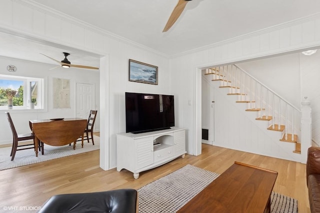 65 Union St, Beacon, NY 12508 - living room with a ceiling fan, crown molding, stairs, and light wood-style flooring