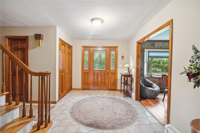 5 Linda Ct, Oyster Bay, NY 11771 - entrance foyer with stairs and baseboards