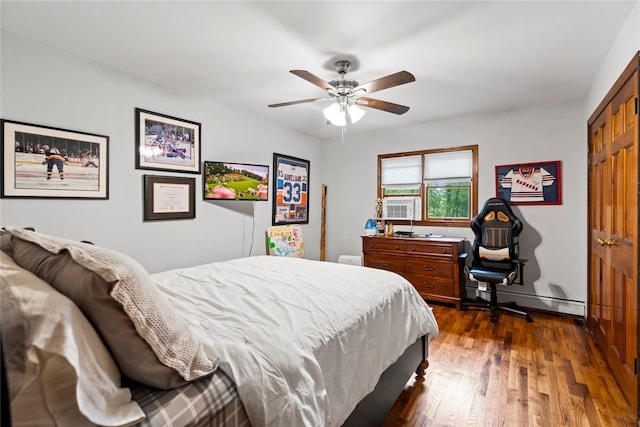 5 Linda Ct, Oyster Bay, NY 11771 - bedroom with a baseboard radiator, dark wood finished floors, and ceiling fan