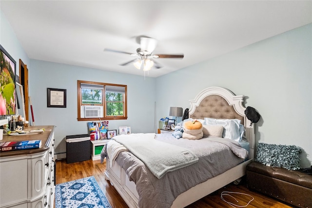 5 Linda Ct, Oyster Bay, NY 11771 - bedroom with wood finished floors, a baseboard heating unit, ceiling fan, and cooling unit