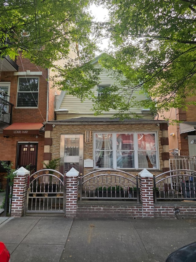 3318 104th St, Corona, NY 11368 - view of front of home featuring a gate