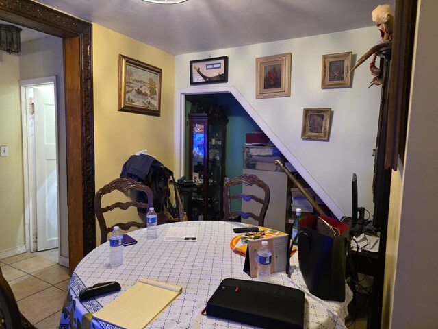 3318 104th St, Corona, NY 11368 - dining space featuring tile patterned floors and baseboards