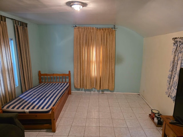 3318 104th St, Corona, NY 11368 - bedroom featuring lofted ceiling and light tile patterned floors