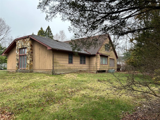 6 Cedarfield Ter, Setauket, NY 11780 - view of property exterior featuring a lawn and roof with shingles