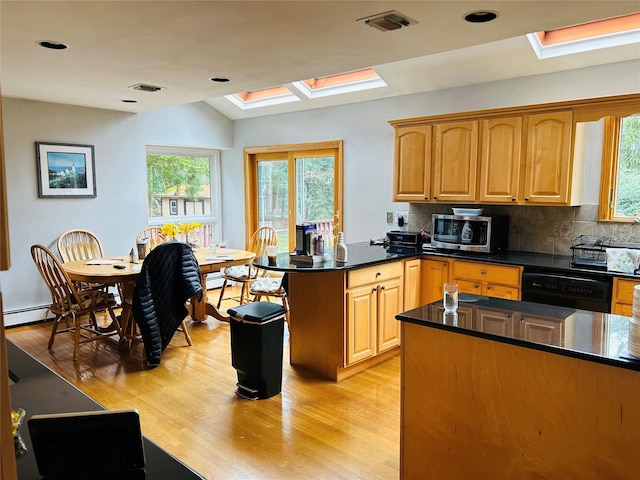 6 Cedarfield Ter, Setauket, NY 11780 - kitchen with a skylight, stainless steel microwave, dishwasher, a peninsula, and backsplash