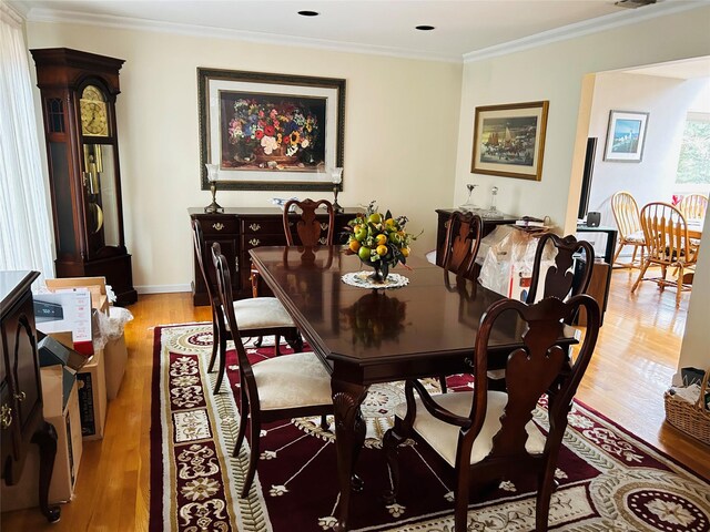 6 Cedarfield Ter, Setauket, NY 11780 - dining room with light wood-type flooring and ornamental molding