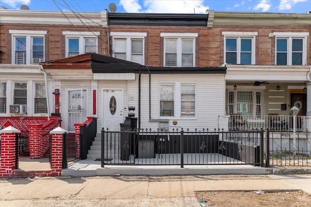 748 Georgia Ave, Brooklyn, NY 11207 - view of property with a fenced front yard and cooling unit