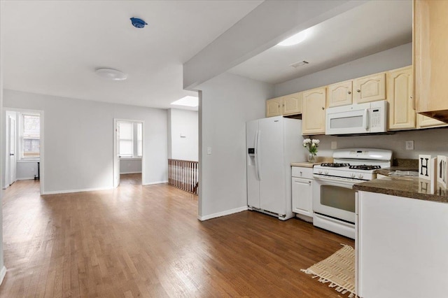 748 Georgia Ave, Brooklyn, NY 11207 - kitchen featuring white appliances, dark wood-style flooring, and dark countertops