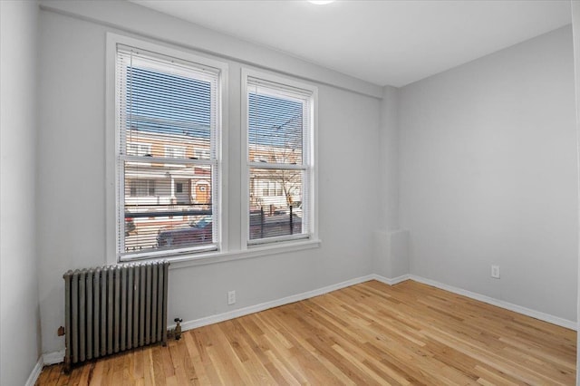 748 Georgia Ave, Brooklyn, NY 11207 - spare room with radiator and wood finished floors