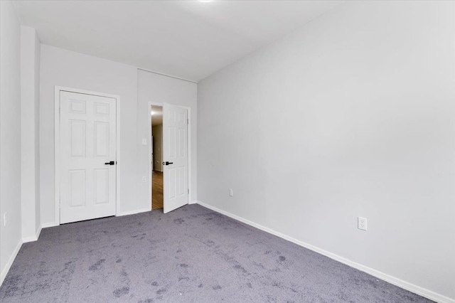 748 Georgia Ave, Brooklyn, NY 11207 - unfurnished bedroom featuring carpet floors and baseboards