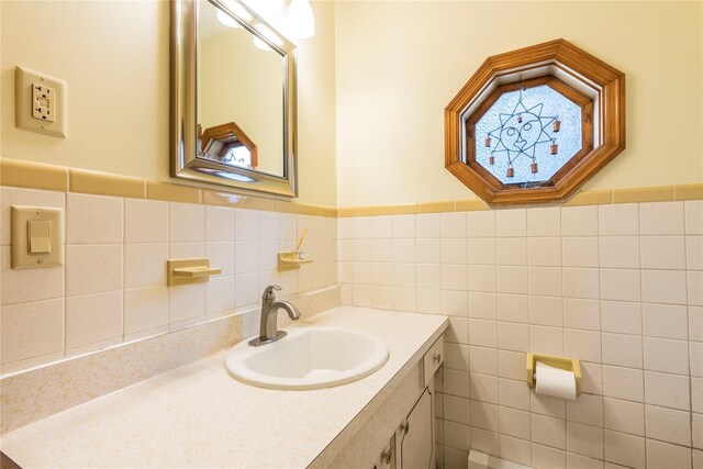 4 Pasture Ln, Poughkeepsie, NY 12603 - bathroom featuring vanity, tile walls, and wainscoting