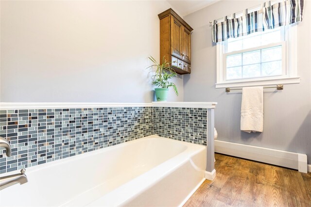 4 Pasture Ln, Poughkeepsie, NY 12603 - bathroom with a bath and wood finished floors