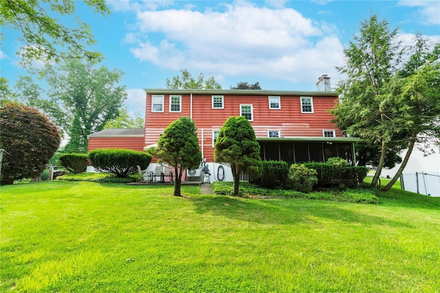 4 Pasture Ln, Poughkeepsie, NY 12603 - back of property with a sunroom and a chimney