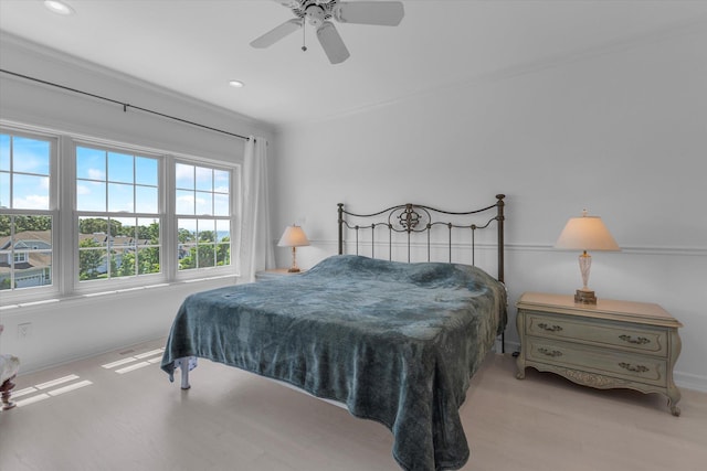 18 Tall Tree Cir, Jamesport, NY 11901 - bedroom with wood finished floors, recessed lighting, ceiling fan, and crown molding