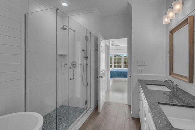 18 Tall Tree Cir, Jamesport, NY 11901 - full bathroom featuring ensuite bathroom, ornamental molding, double vanity, a stall shower, and a freestanding tub