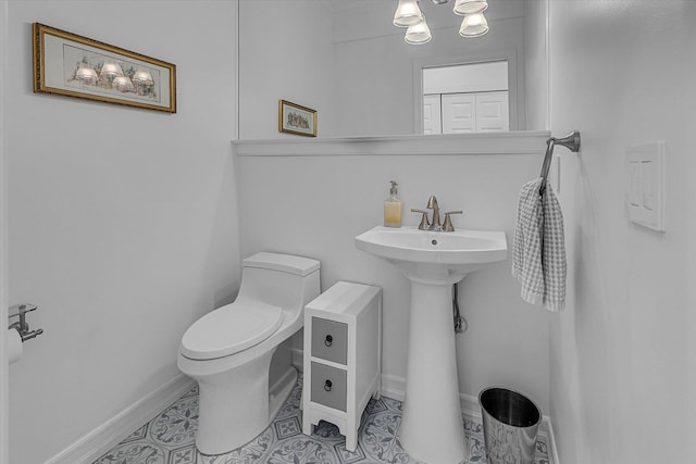 18 Tall Tree Cir, Jamesport, NY 11901 - bathroom with toilet and tile patterned flooring