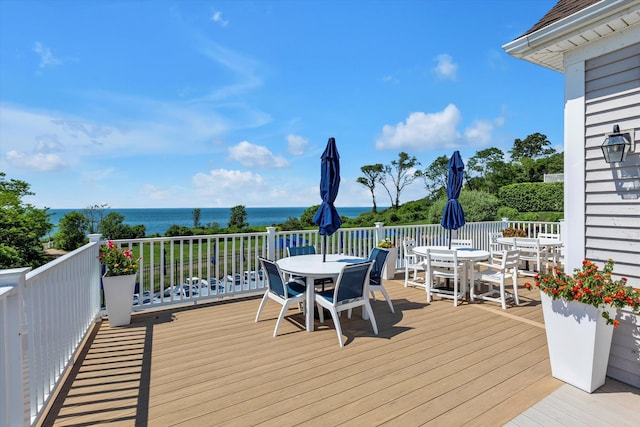 18 Tall Tree Cir, Jamesport, NY 11901 - deck featuring outdoor dining space and a water view