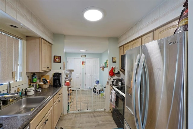 18 Larch Ct, Fishkill, NY 12524 - kitchen featuring freestanding refrigerator, light brown cabinetry, black electric range, and dark countertops