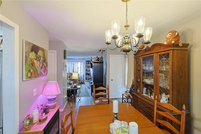 18 Larch Ct, Fishkill, NY 12524 - dining room with a chandelier