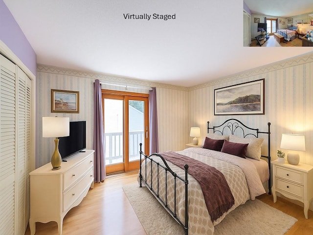 18 Larch Ct, Fishkill, NY 12524 - bedroom featuring wallpapered walls, access to outside, light wood-style flooring, and a closet