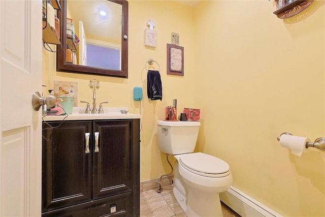 18 Larch Ct, Fishkill, NY 12524 - half bath featuring a baseboard radiator, vanity, and tile patterned floors