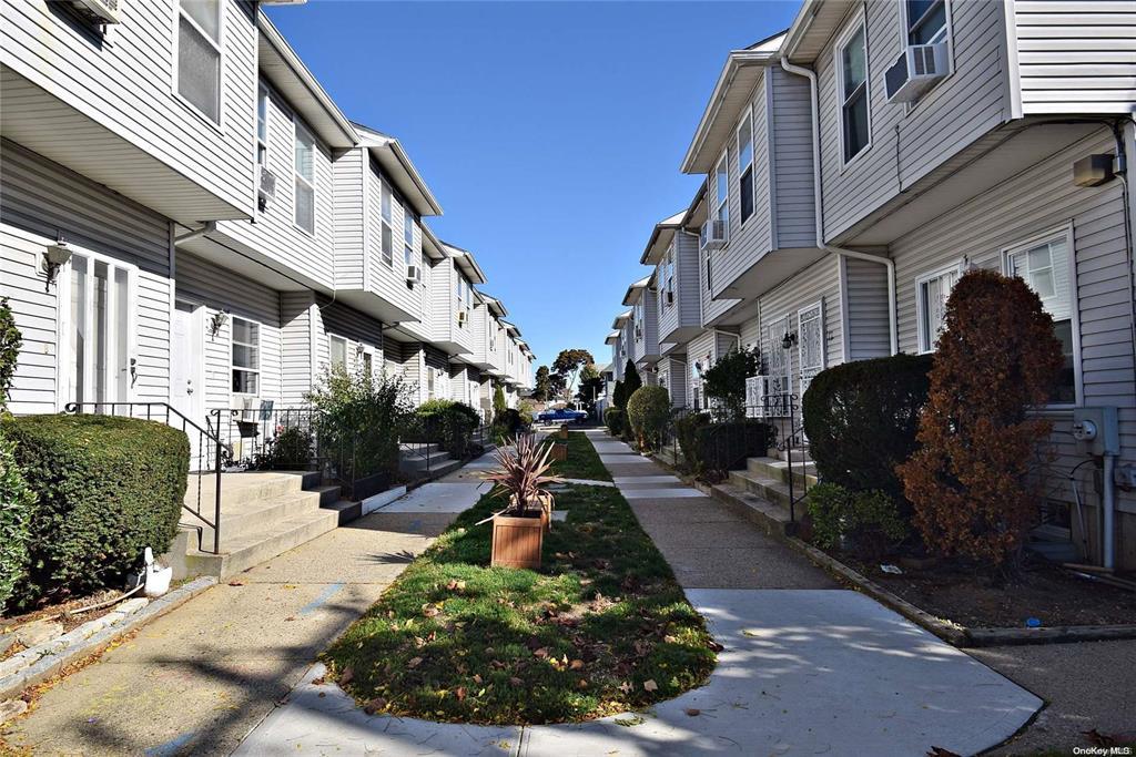 66 Henry St Unit 1, Hempstead, NY 11550 - surrounding community with a residential view