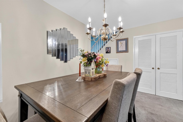 114 Halgren Cres, Haverstraw, NY 10927 - dining space featuring a chandelier, carpet floors, and stairs