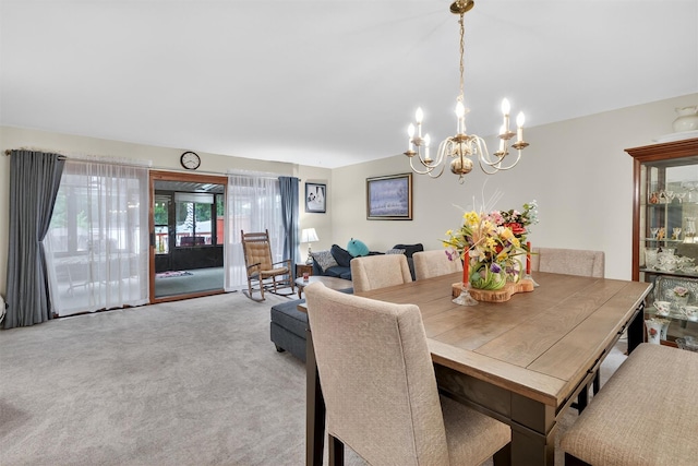 114 Halgren Cres, Haverstraw, NY 10927 - dining room featuring carpet and a chandelier