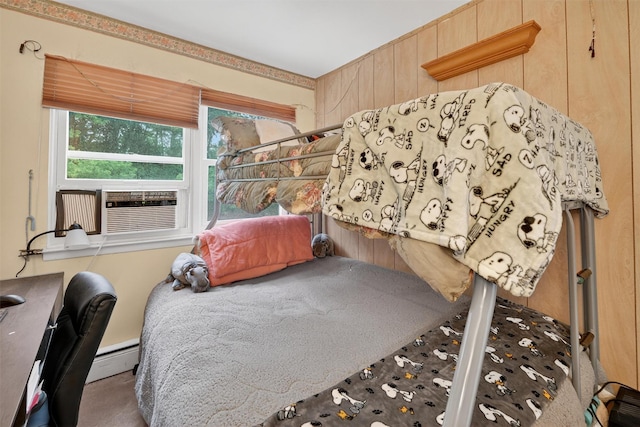 114 Halgren Cres, Haverstraw, NY 10927 - bedroom featuring a baseboard heating unit and wooden walls