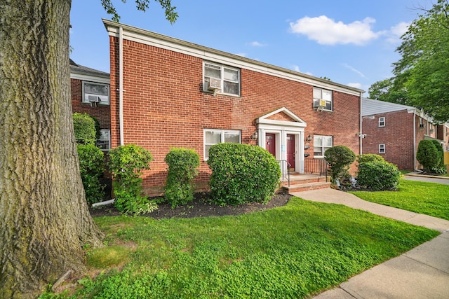 520 Tuckahoe Rd Unit 3B, Yonkers, NY 10710 - view of front facade with a front yard and brick siding