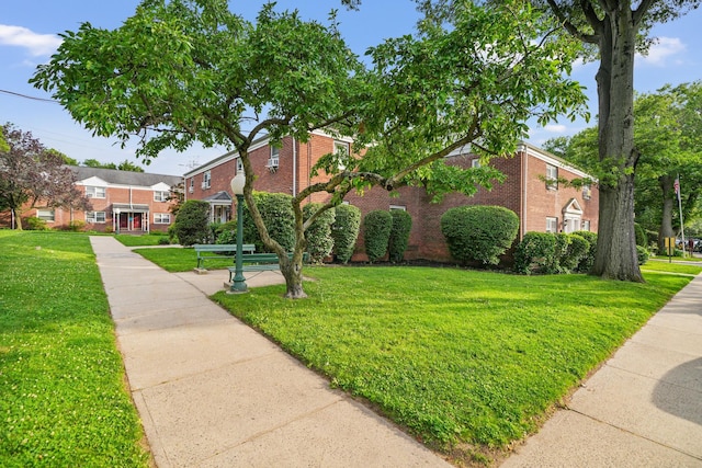 520 Tuckahoe Rd Unit 3B, Yonkers, NY 10710 - view of front of home with a front lawn and brick siding