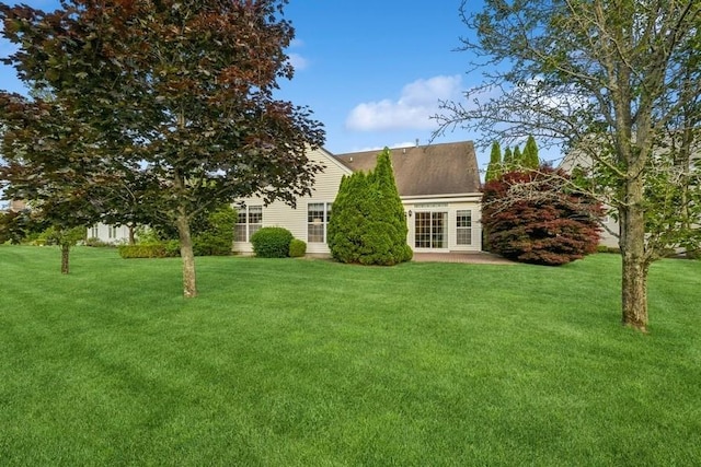 15 Louden Loop, Mount Sinai, NY 11766 - rear view of property with a yard