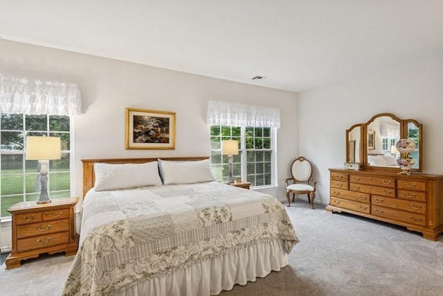 15 Louden Loop, Mount Sinai, NY 11766 - bedroom featuring carpet flooring and multiple windows