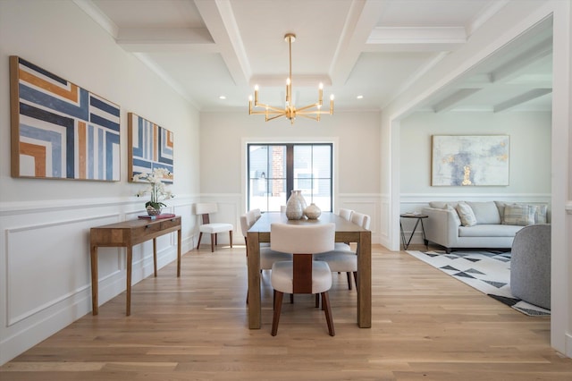724 Pleasant Ave, Westbury, NY 11590 - dining area with coffered ceiling, a chandelier, beamed ceiling, light wood-type flooring, and ornamental molding