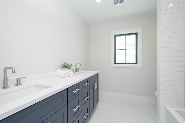724 Pleasant Ave, Westbury, NY 11590 - full bathroom with a bath and double vanity