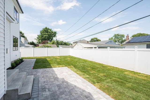 724 Pleasant Ave, Westbury, NY 11590 - fenced backyard featuring a patio area