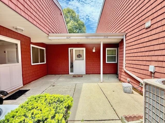 1104 Drew Dr, Saint James, NY 11780 - property entrance featuring a patio