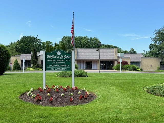 1104 Drew Dr, Saint James, NY 11780 - community / neighborhood sign featuring a lawn