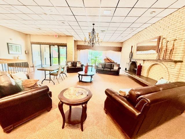 1104 Drew Dr, Saint James, NY 11780 - common area featuring brick wall