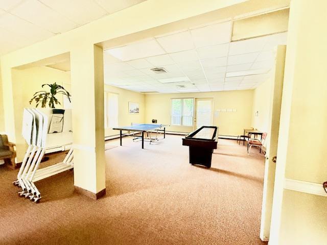 1104 Drew Dr, Saint James, NY 11780 - rec room with a paneled ceiling and carpet floors