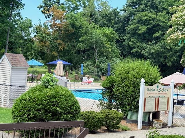 1104 Drew Dr, Saint James, NY 11780 - community pool with a storage unit