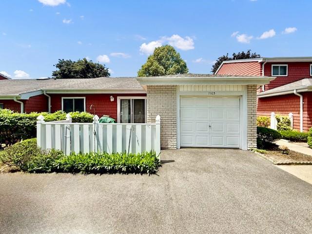 1104 Drew Dr, Saint James, NY 11780 - view of front of home featuring an attached garage and driveway