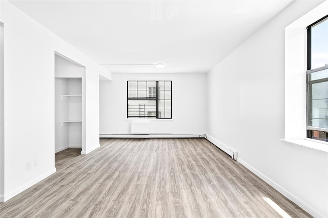 800 Brook Ave Unit 13B, Bronx, NY 10451 - unfurnished bedroom with wood finished floors and a closet