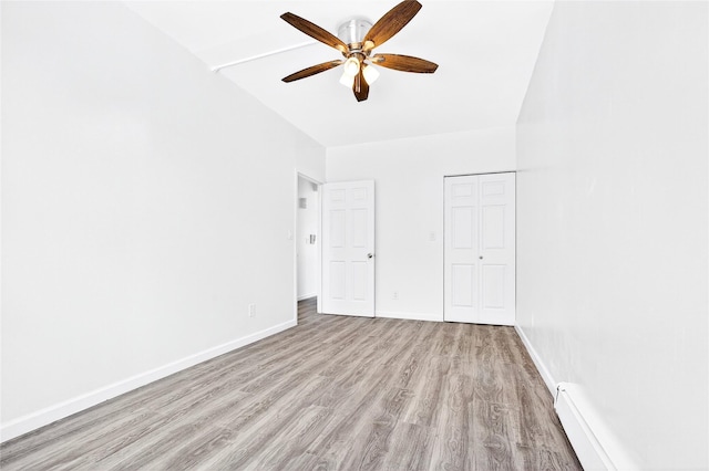 800 Brook Ave Unit 13B, Bronx, NY 10451 - unfurnished bedroom featuring light wood finished floors, a closet, and ceiling fan
