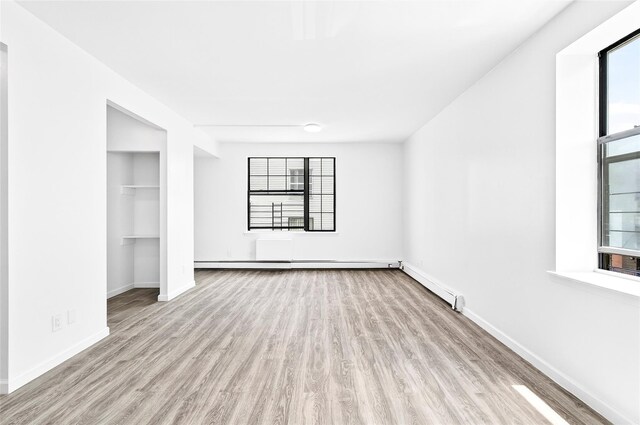 800 Brook Ave Unit 13B, Bronx, NY 10451 - unfurnished bedroom featuring wood finished floors and a closet