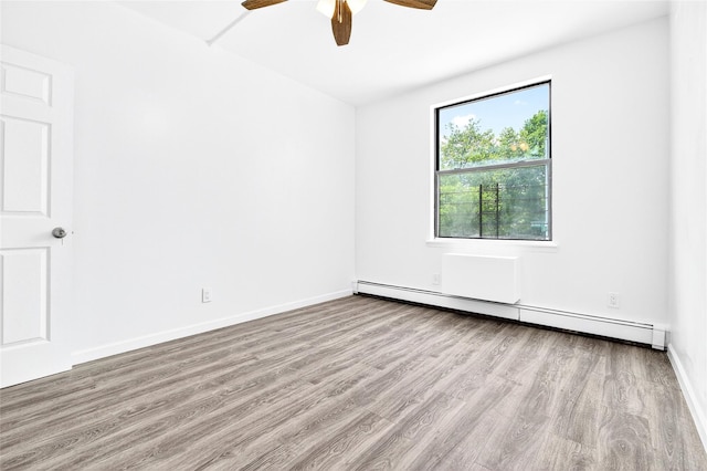 800 Brook Ave Unit 13B, Bronx, NY 10451 - unfurnished room with baseboard heating, ceiling fan, and wood finished floors
